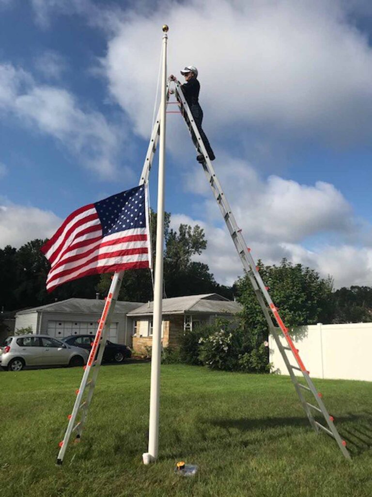 flagpole repair on 25' ladder 2