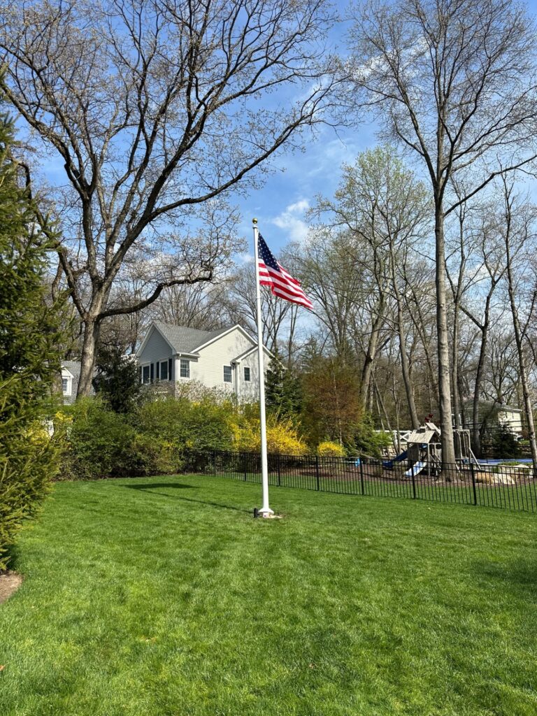 Professional residential flagpole installation by America the Beautiful Flags & Flagpoles in New Jersey flagpole.installation.jpg